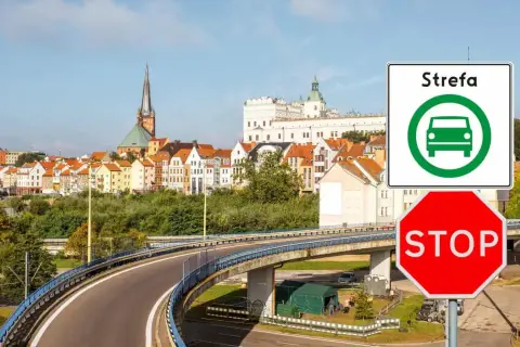 Znak "Strefa czystego transportu Szczecin" i czerwony znak STOP przed panoramą miasta.
