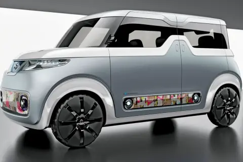 Kanciaste samochody z futurystycznym designem, świecącymi detalami i kolorowymi panelami.
