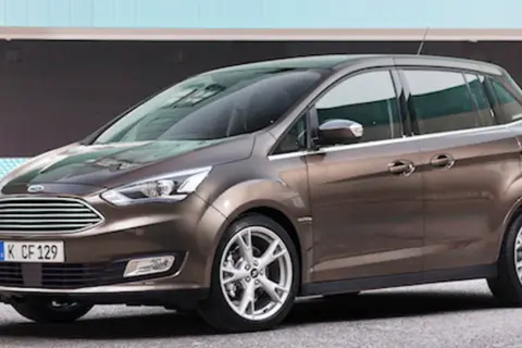 Brązowy Ford C-Max prezentuje swoje eleganckie linie, sugerując bogate ford c-max wersje wyposażenia.