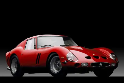 Klasyczny czerwony Ferrari 250 GTO, ikona włoskich marek samochodów, błyszczy na czarnym tle.